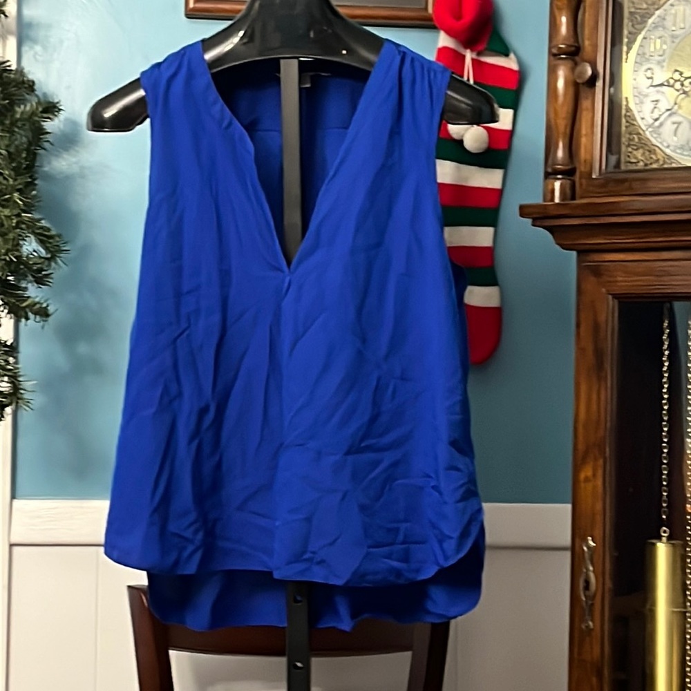 American Eagle royal blue, sleeveless blouse, low v neck, flowy, high low
